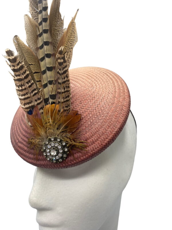Small milk chocolate brown headpiece with feather detail.